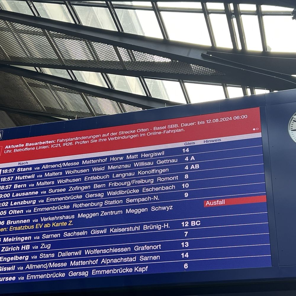 Large screen for arrivals and departures.