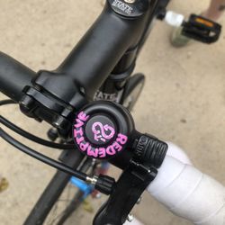 Redemptive Cycles - A bicycle handlebar Bell that is sporting the name of the company and their insignia!