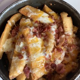 Cheese and bacon fries Cheese and bacon fries