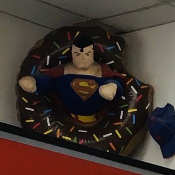 John's Donuts - Superman figures prominently in the decor. - Donuts Near Me - Saint Louis, Missouri
