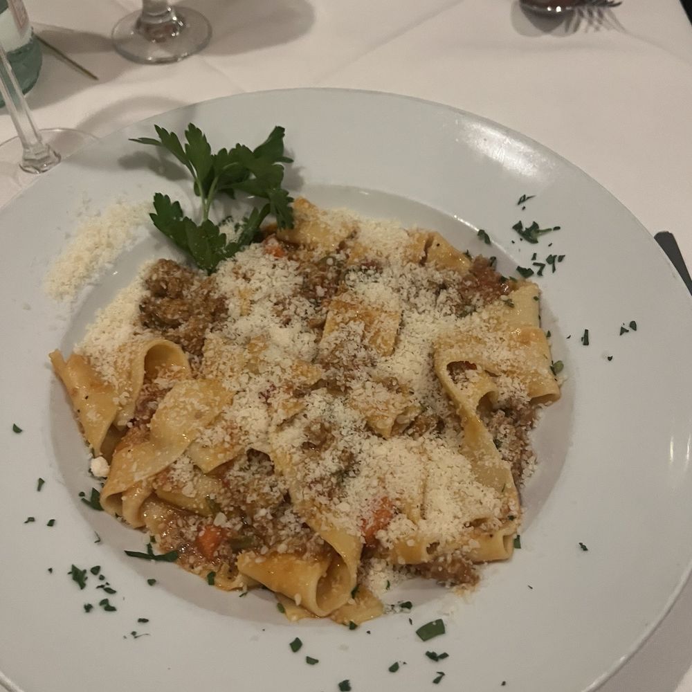 Mangiamo Ristorante - Classic Bolognese with extra Parmesan - Italian Near Me - Manhattan Beach, California Mangiamo Ristorante - Classic Bolognese with extra Parmesan - Italian Near Me - Manhattan Beach, California