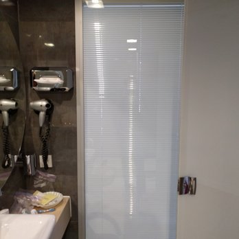 Hotel Bayers - Blinds as seen from the bathroom.  On the other side is the bed. - Hotels Near Me - Munich, BY