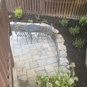 Sunrise Landscape and Design - a patio with a table and chairs - Landscaping Near Me - Sterling, Virginia Sunrise Landscape and Design - a patio with a table and chairs - Landscaping Near Me - Sterling, Virginia