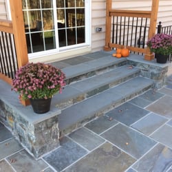 Keystone Remodeling and Handyman Services - Slate patio Leesburg, Va. Cedar trellis with aluminum balusters.