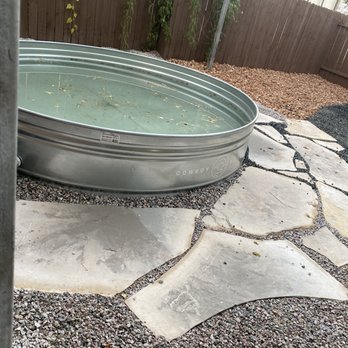 Cardenas Design and Build - Flagstones & Xeriscape around stock tank pool - Masonry/Concrete Near Me - Spring Branch, Texas