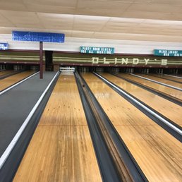 a bowling alley with bowling lanes a bowling alley with bowling lanes