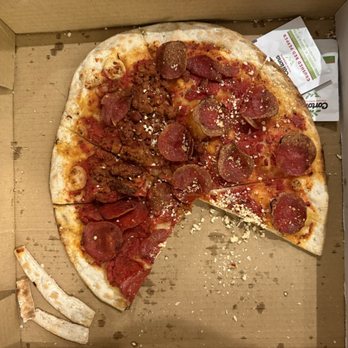 Gilroy's Kitchen + Pub + Patio - Sausage and pepperoni(sausage on 1/4) - New American Near Me - West Des Moines, Iowa Gilroy's Kitchen + Pub + Patio - Sausage and pepperoni(sausage on 1/4) - New American Near Me - West Des Moines, Iowa