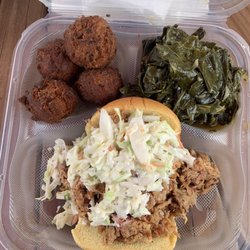 Harbor Que BBQ - Pulled pork sandwich with coleslaw, collard and hush puppy sides.