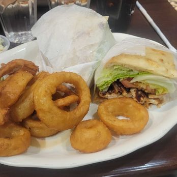 7th Ave Donuts & Diner - MTA sandwich - grilled chicken, bacon, lettuce, tomato, bacon and tzaziki sauce on pita. With onion rings. - Donuts Near Me - Brooklyn, New York