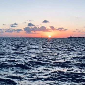 Galveston Water Adventures - View of the sunset from the boat. - Boat Charters Near Me - Galveston, Texas Galveston Water Adventures - View of the sunset from the boat. - Boat Charters Near Me - Galveston, Texas