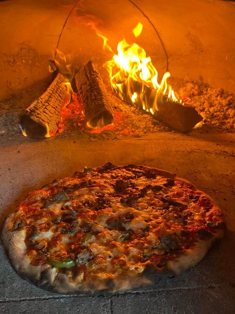 Fire On The Mountain Pizza Logo