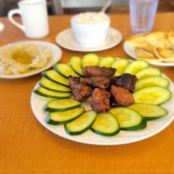 Empire Diner - Lamb kebab, baba ganoush & grits.