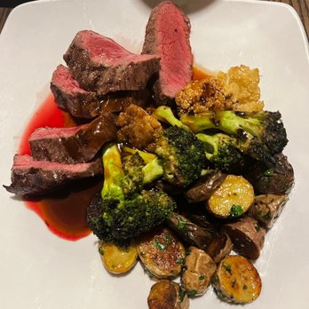 Holman's Table - Sirloin and veggies- the potato rounds were to die for. - Bars Near Me - Saint Paul, Minnesota Holman's Table - Sirloin and veggies- the potato rounds were to die for. - Bars Near Me - Saint Paul, Minnesota