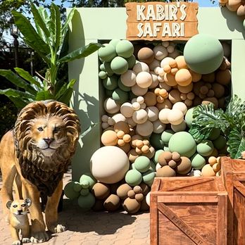 KelSweet Event Rentals - Safari theme backdrop with our life size lion and cub statue - Party Equipment Rentals Near Me KelSweet Event Rentals - Safari theme backdrop with our life size lion and cub statue - Party Equipment Rentals Near Me