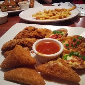 O'Charley's Restaurant & Bar - Combo Appetizer: Chicken tenders, loaded potato skins, & cheese wedges - American Near Me - Owensboro, Kentucky