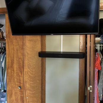 DH Home Services - Tv and soundbar mounted in bedroom with power bridge outlet installed - Handyman Near Me
