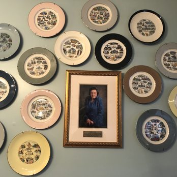 Eva's On Main - The late Miss Eva picture and one of her collections of plates. - Southern Near Me - Summerville, South Carolina