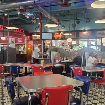 Portillo's - nice big diner with a monitor of all the orders - Hot Dogs Near Me - Orlando, Florida Portillo's - nice big diner with a monitor of all the orders - Hot Dogs Near Me - Orlando, Florida