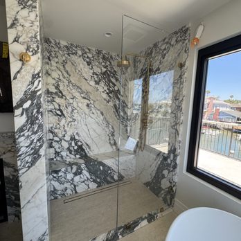 Local Glass & Screen - Fixed shower glass panel with satin brass hardware, Newport Beach, California - Glass & Mirrors Near Me - Laguna Hills, California Local Glass & Screen - Fixed shower glass panel with satin brass hardware, Newport Beach, California - Glass & Mirrors Near Me - Laguna Hills, California