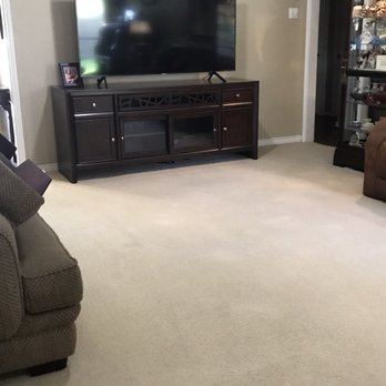 Made New Again - a living room with a flat screen tv - Carpet Cleaning Near Me - Dickinson, Texas Made New Again - a living room with a flat screen tv - Carpet Cleaning Near Me - Dickinson, Texas