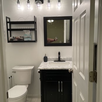Ramirez Home Remodeling, LLC - Completed bathroom drywall, vanity, faucet, mirror, shelf, light, toilet paper holder and towel bar installation. - Painters Near Me Ramirez Home Remodeling, LLC - Completed bathroom drywall, vanity, faucet, mirror, shelf, light, toilet paper holder and towel bar installation. - Painters Near Me