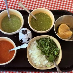 Carnitas Los Tarascos - Mild, hot, and medium salsa with onions, cilantro, and lime wedges!