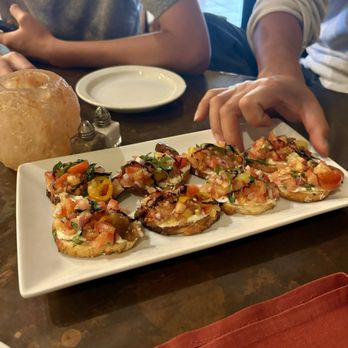 Sheila's Place - Cherry Tomato Bruschetta - New American Near Me - Camarillo, California Sheila's Place - Cherry Tomato Bruschetta - New American Near Me - Camarillo, California