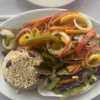 The Karibbean Lounge Express - Red snapper with rice and beans and vegetables - Caribbean Near Me - Hyannis, Massachusetts The Karibbean Lounge Express - Red snapper with rice and beans and vegetables - Caribbean Near Me - Hyannis, Massachusetts