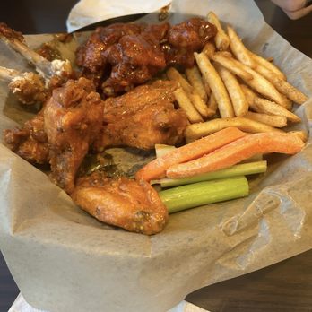 Happy Place Pub And Play - 12 pc wings Nashville hot & garlic buffalo extra crispy. So good!!!!! 10/10 - Pubs Near Me - Pace, Florida Happy Place Pub And Play - 12 pc wings Nashville hot & garlic buffalo extra crispy. So good!!!!! 10/10 - Pubs Near Me - Pace, Florida