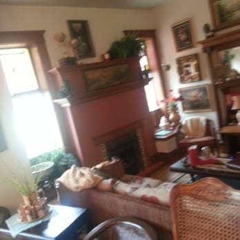 The Rusted Poppy - Fireplace sitting area. - Bed & Breakfast Near Me - Pueblo, Colorado