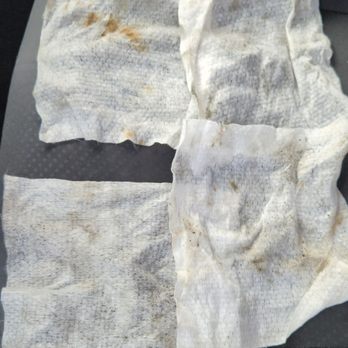 Next Level Detail - Wipes after I wiped down the hard surfaced and on the sides of the arm rest after car was "cleaned". - Auto Detailing Near Me