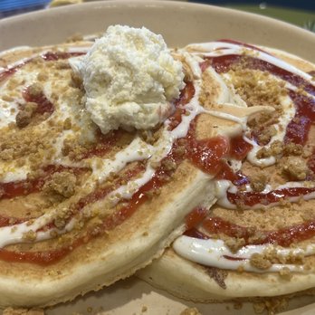 Snooze, an A.M. Eatery - Pancake of the Week (Southern Charm) Spirals of sweet cream and strawberry coulis, lemon mascarpone and cornbread crumbles. - Breakfast & Brunch Near Me - Tucson, Arizona Snooze, an A.M. Eatery - Pancake of the Week (Southern Charm) Spirals of sweet cream and strawberry coulis, lemon mascarpone and cornbread crumbles. - Breakfast & Brunch Near Me - Tucson, Arizona