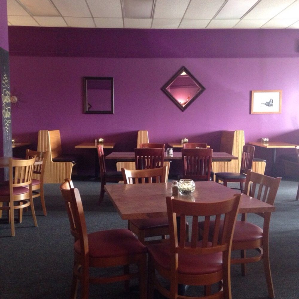 Booth and table seating, very handicap accessible. Love the purple! Booth and table seating, very handicap accessible. Love the purple!