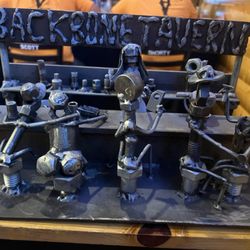 Backbone Tavern - Metal sculpture by our table