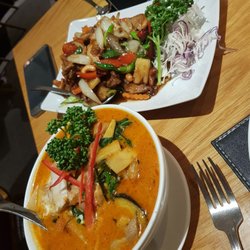 Phetpailin - Duck curry with pineapple (in bowl) tamarind duck in other