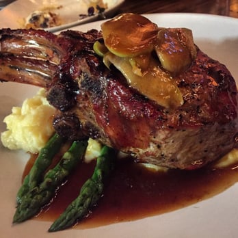 Saint & Second - This porkchop is HUGE! So delish!!!! - New American Near Me - Long Beach, California