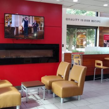 Wendy's - a restaurant with a bar and chairs - Burgers Near Me - Austin, Texas