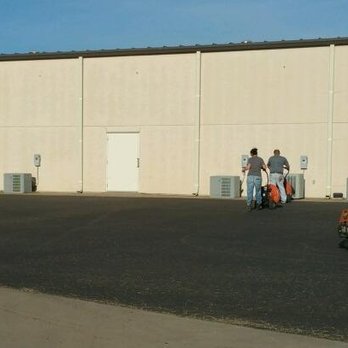 Precision Pavement Specialists - Parking Lot Clean Off - Preparing for seal coat on Cadavers, a local Lubbock business. - Masonry/Concrete Near Me - Lubbock, Texas