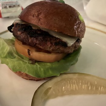 The Living Room - Half lb beef burger, medium well with Swiss cheese - Cocktail Bars Near Me - Miami Beach, Florida