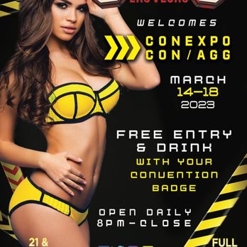 Scores - a woman in a bikini and hard hat - Strip Clubs Near Me - Las Vegas, Nevada
