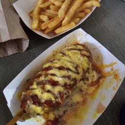 Mozzarella dog with ketchup,  sweet chili, honey mustard, and garlic parmesan with fries