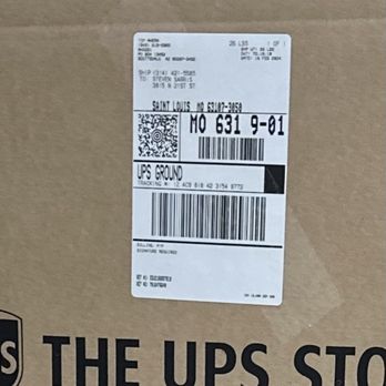 The UPS Store - A cardboard box from UPS with a shipping label attached, showing tracking details and destination information. - Shipping Centers Near Me - Phoenix, Arizona