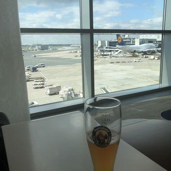 Lufthansa Senator Lounge - Lounging in a chair drinking a beer and waiting for my next flight.. yup took a nap too - Airport Lounges Near Me