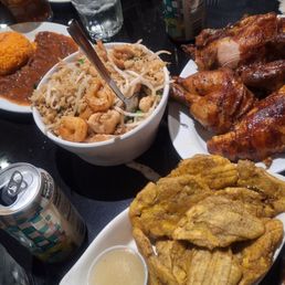 Whole chicken, tostones, Arroz Chaufa special, rice and red beans. Whole chicken, tostones, Arroz Chaufa special, rice and red beans.
