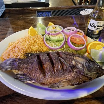 Los 3 Amigos - a plate of fish and rice - Mexican Near Me - Manchester, Tennessee