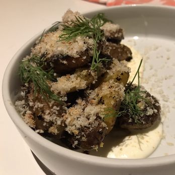 Kismet - Fried potatoes with labneh, macadamia nut, shavings of cured scallops, and urfa pepper. - Mediterranean Near Me - Los Angeles, California