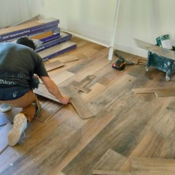 Advanced 24/7 Restoration LLC | Water Damage Denver - Laying new LVP flooring. - Damage Restoration Near Me - Denver, Colorado