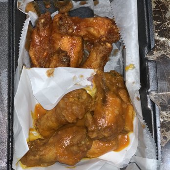 Wing Station - Bone in Top flavor: mango habanero Bottom flavor: tangy sriracha gold - Chicken Wings Near Me - Sugar Land, Texas Wing Station - Bone in Top flavor: mango habanero Bottom flavor: tangy sriracha gold - Chicken Wings Near Me - Sugar Land, Texas