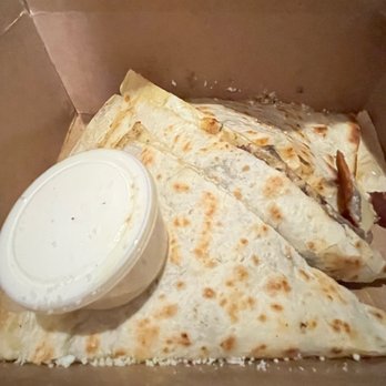 Coyo Taco - 9/16/2022 look at the right side: That's where the burnt cheese is. - Mexican Near Me - Miami, Florida