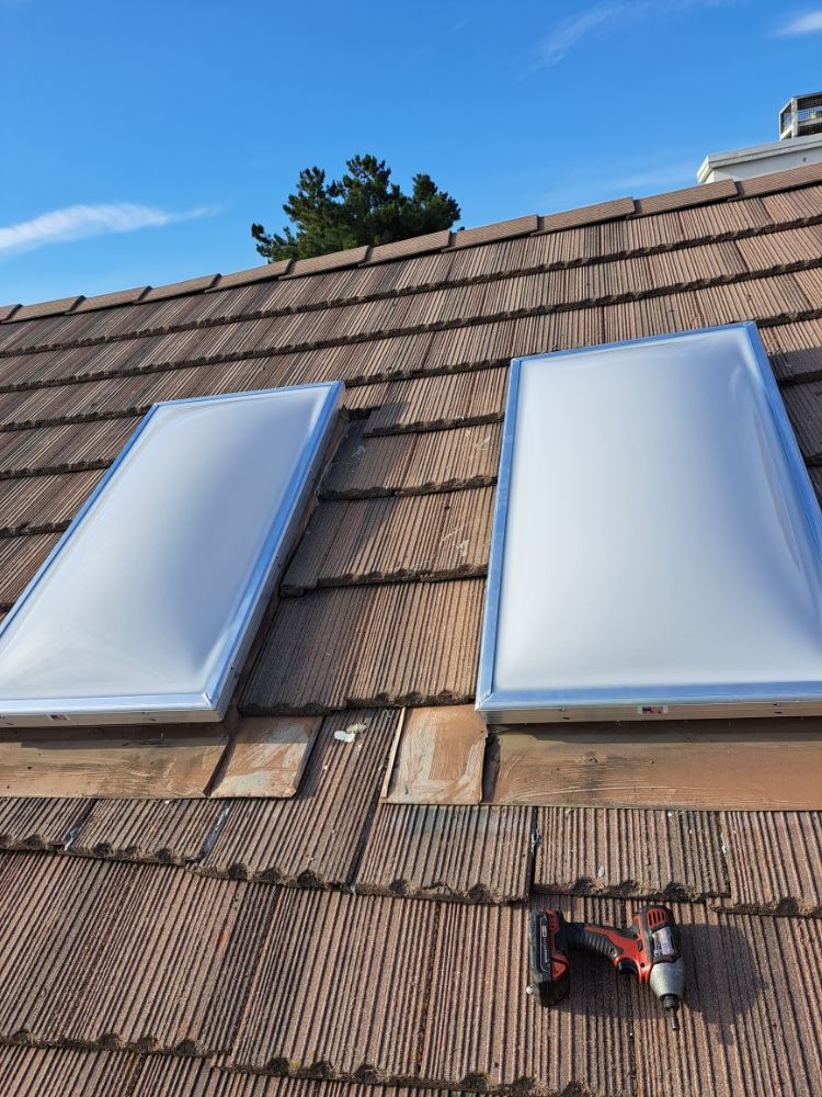 Slide of Eleazars Roofing